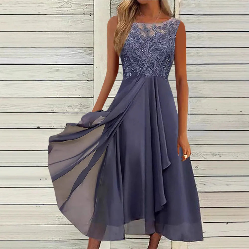 Women's sleeveless green chiffon dress with lace embroidery and a mid-length flowy skirt.