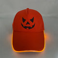 Halloween LED baseball cap with light-up front panel showing pumpkin smile design