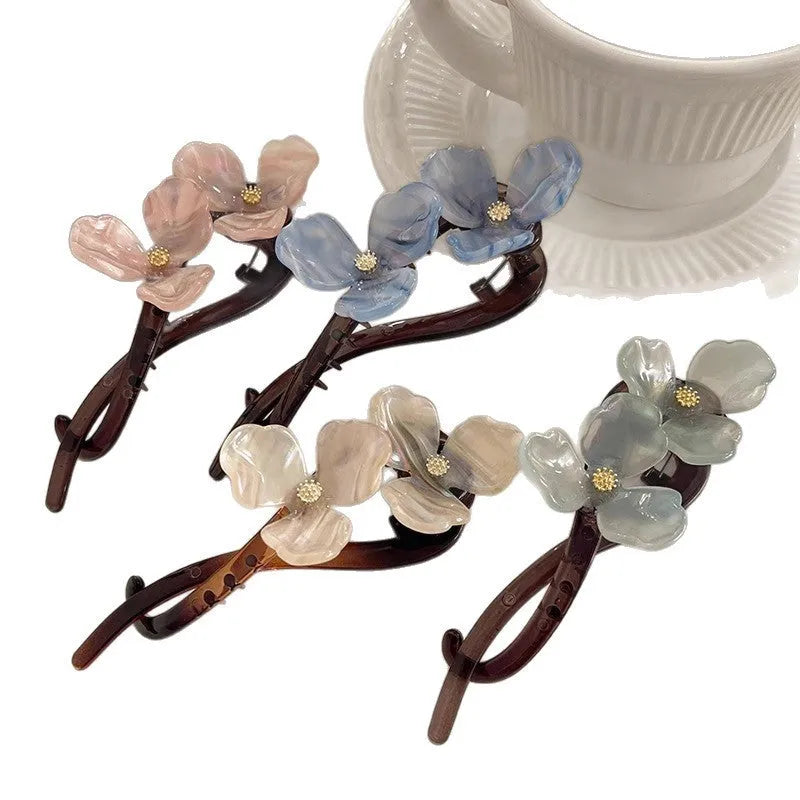 Retro acrylic flower petal bobby pin hair clip in beige, blue, light blue, or pink colour.