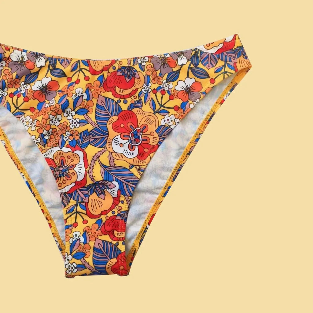 Women's plus size floral print bikini swimsuit with adjustable straps in briefs cut