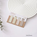 Set of four miniature magnetic bookmarks with Morandi colour block designs in different shades