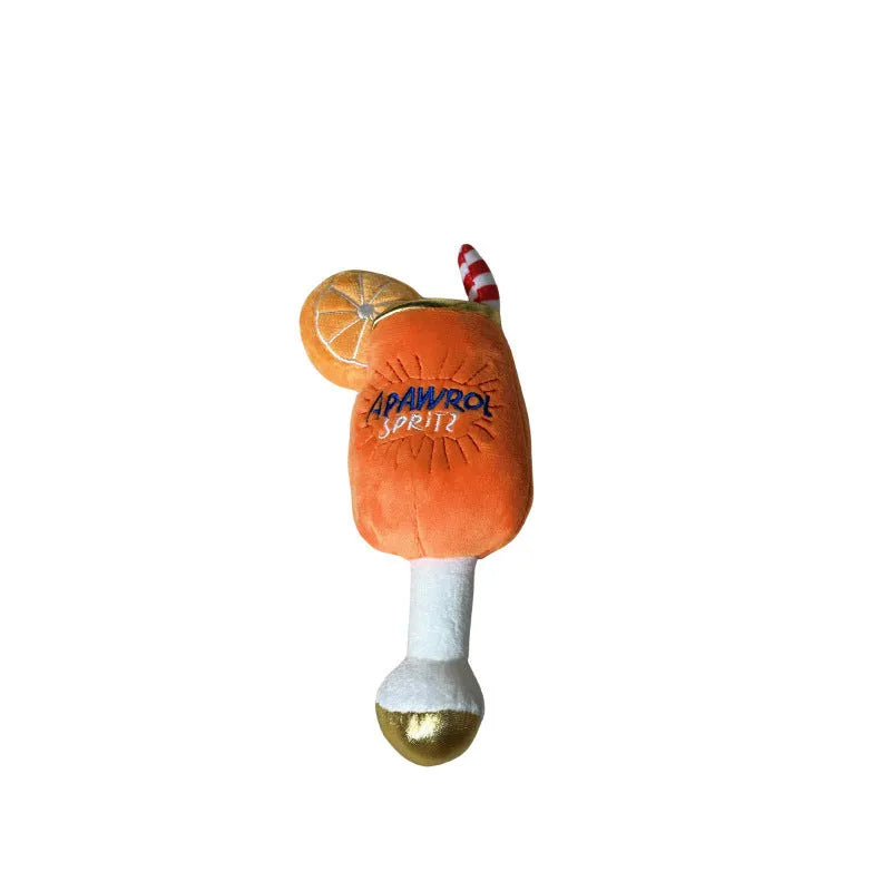 Yellow plush beer bottle squeaky dog toy for interactive play and teeth cleaning.