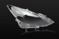 Mazda 3 Exela replacement headlamp cover with tube of snake glue adhesive.