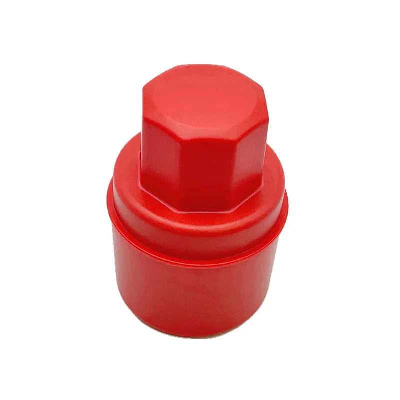 Black and red tyre oil sponge brushes with lids on a white background.