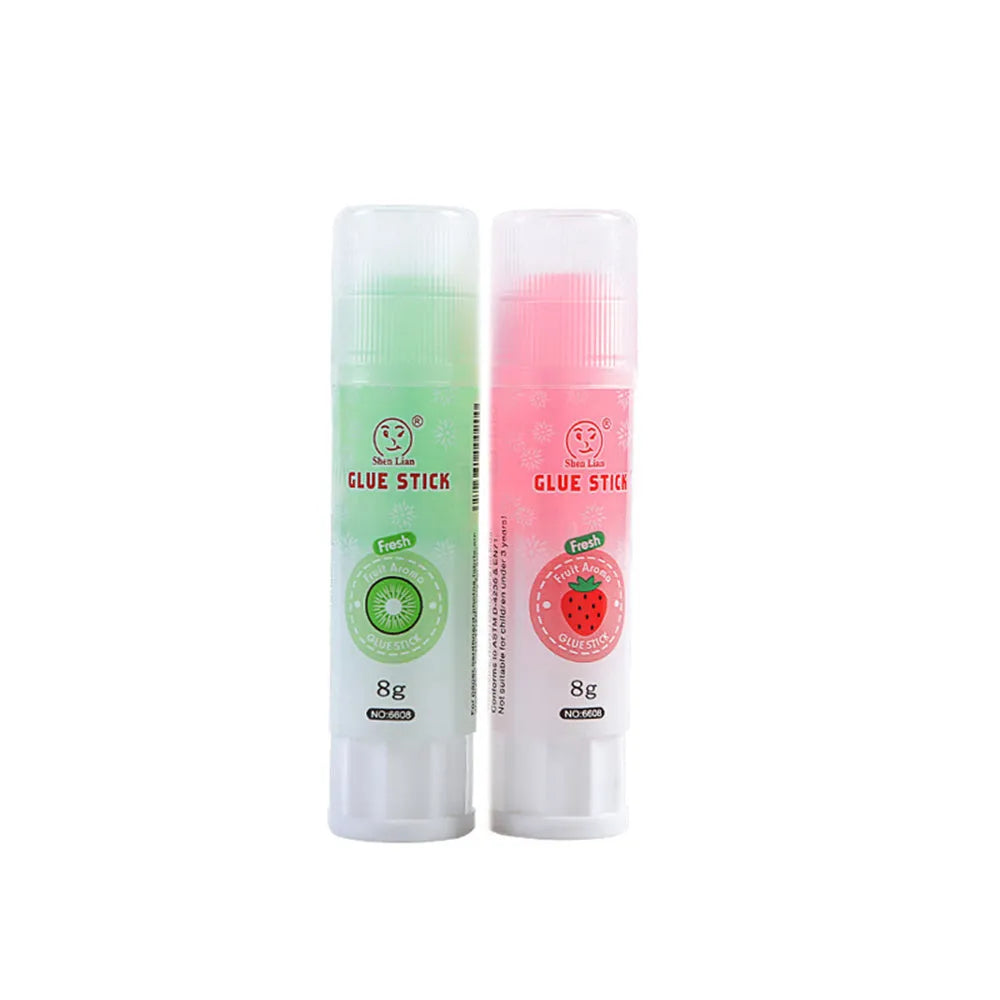 Jelly solid glue stick with fruit printing, 8.5 cm long, shown next to a ruler for scale.