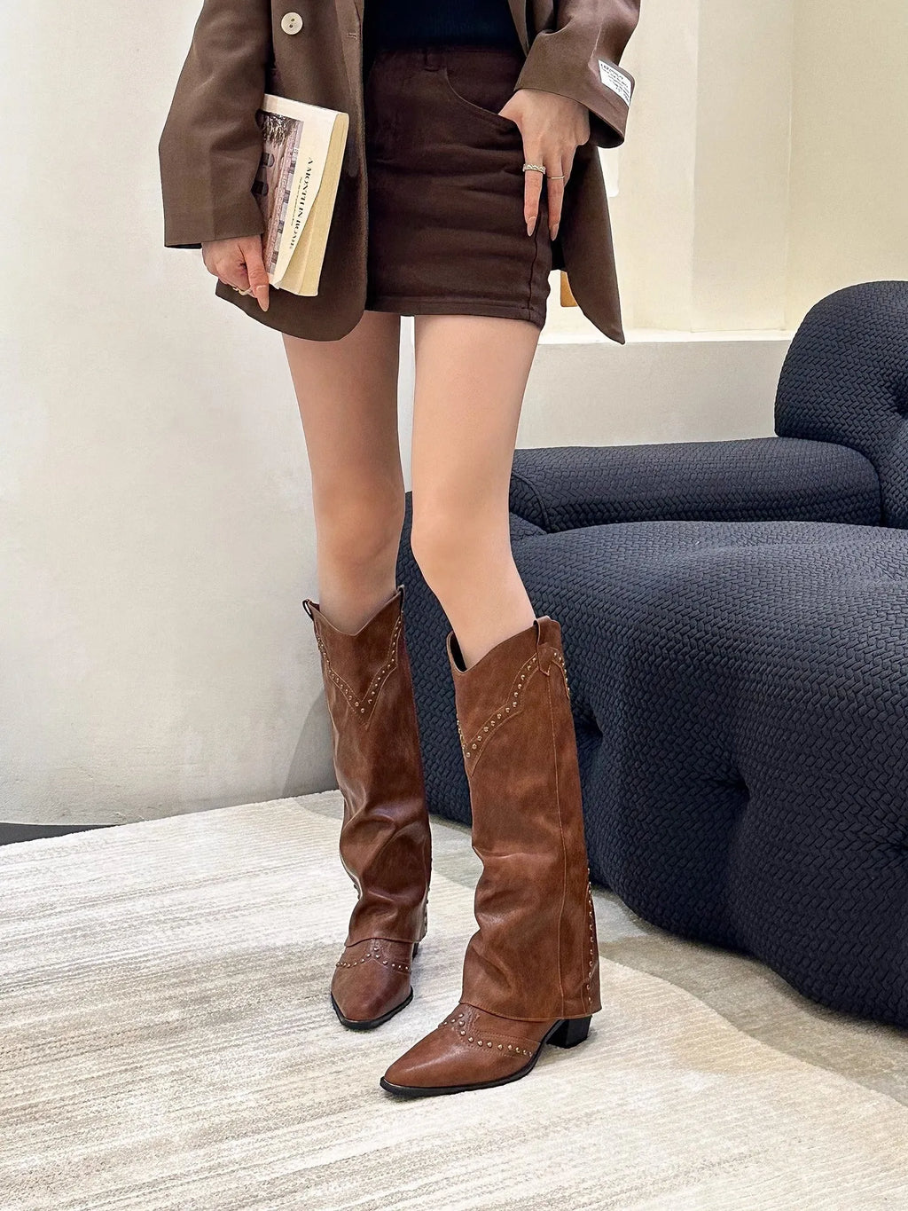 Women's long khaki brown retro Western boots with rivet detail, mid heel, and microfibre upper.