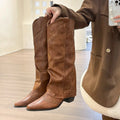Women's long khaki brown retro Western boots with rivet detail, mid heel, and microfibre upper.