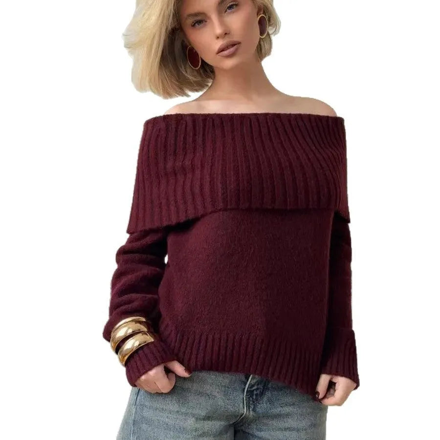 Grey off-the-shoulder strapless sweater with a 3D textured pattern, shown on a model.