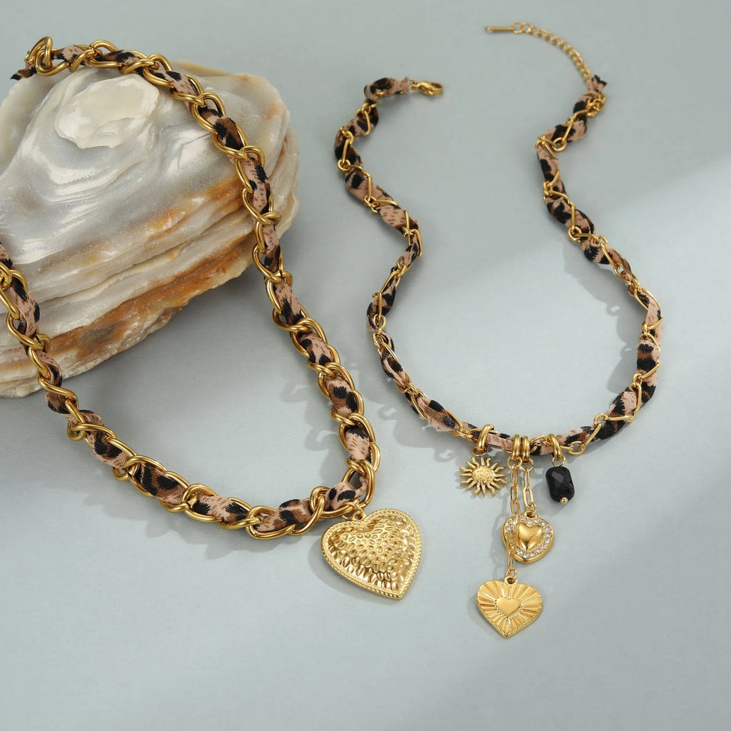 Women's stainless steel leopard love pendant necklace with geometric design and regular chain