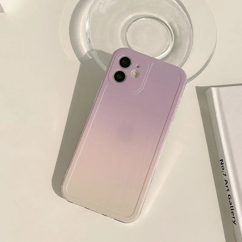 Yellow and purple gradient silicone iPhone case with a retractable viewing stand extended.
