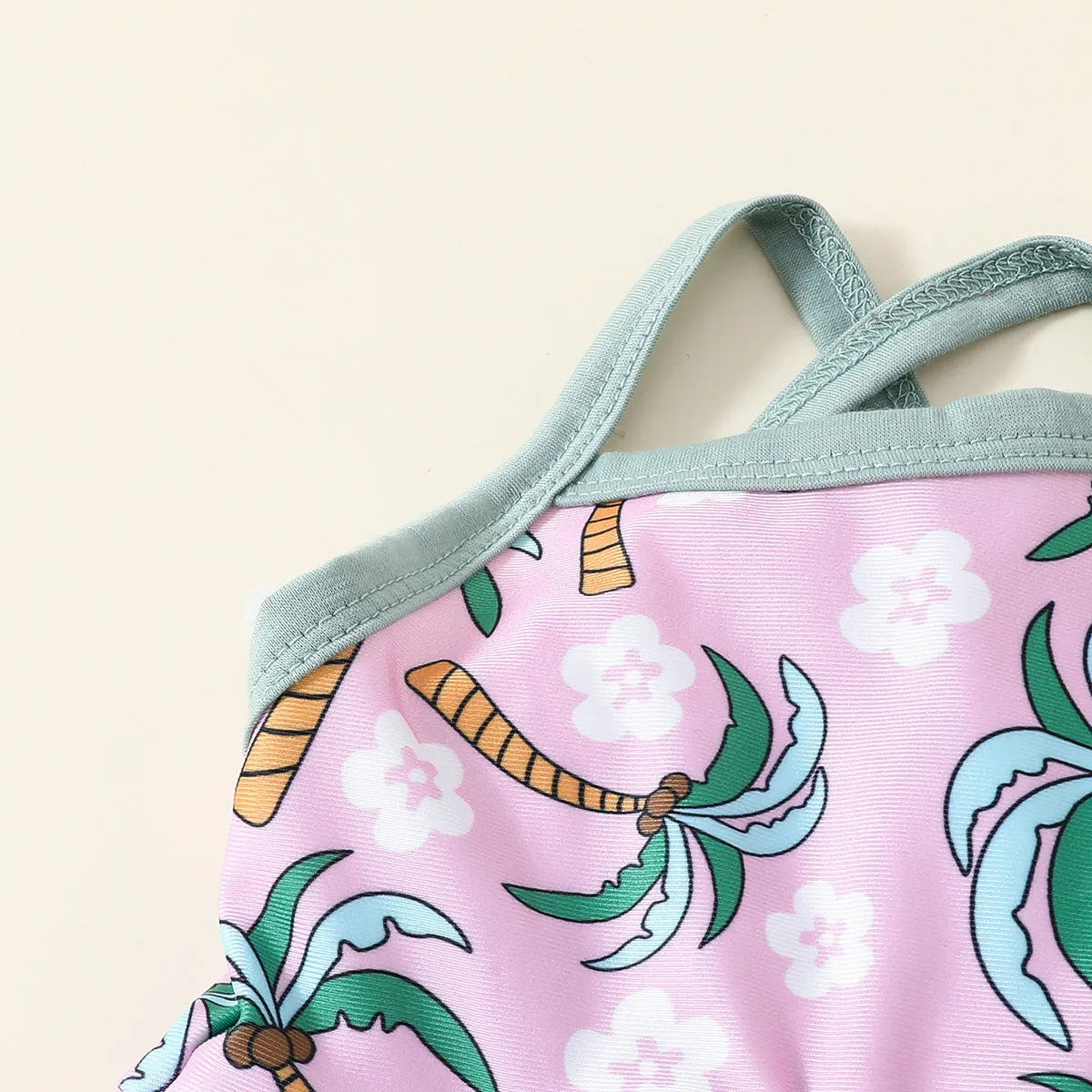 White polyester two-piece swimsuit set for girls, featuring a shirt and shorts.
