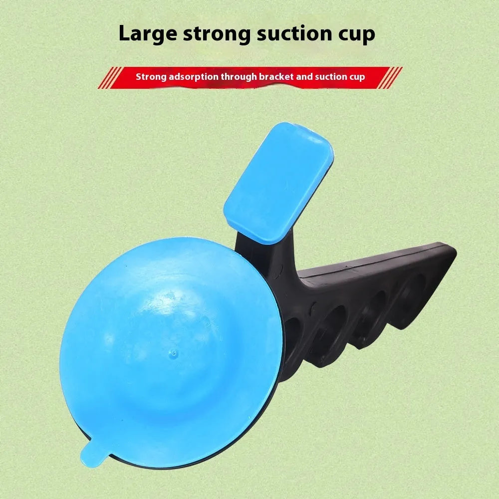Black plastic car fishing rod bracket with suction cup mount for holding one fishing rod in a vehicle.