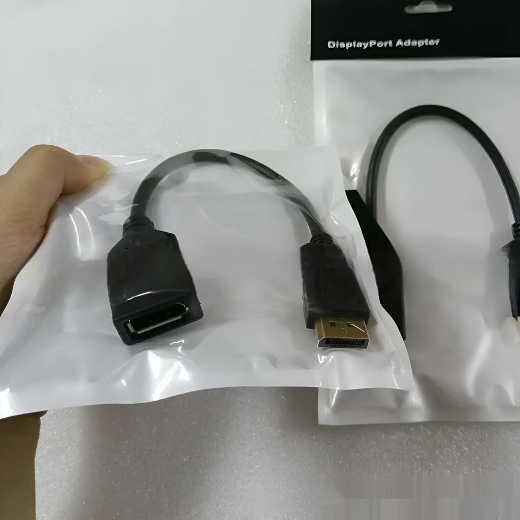 Black DisplayPort DP male to female extension cable with rotating busbar, approximately 10cm long