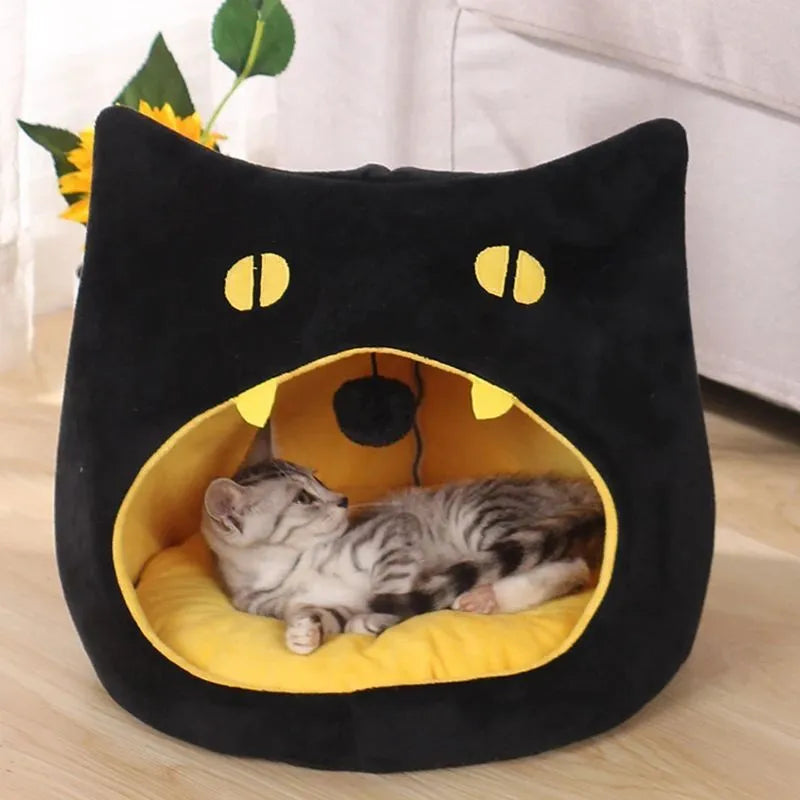 Soft plush covered cat cave bed with anti-slip bottom for cats and small dogs.