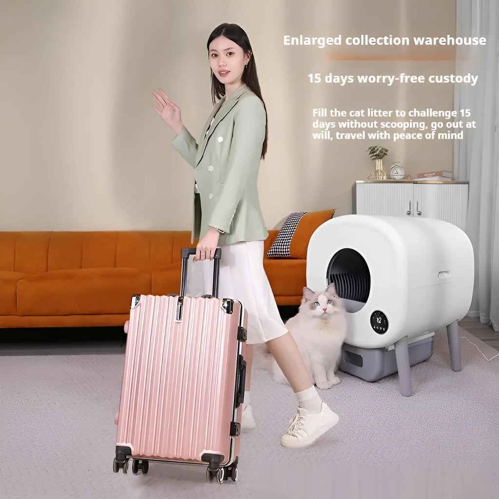 Automatic self-cleaning cat litter box made from white ABS plastic with a cleaning brush and tablets.