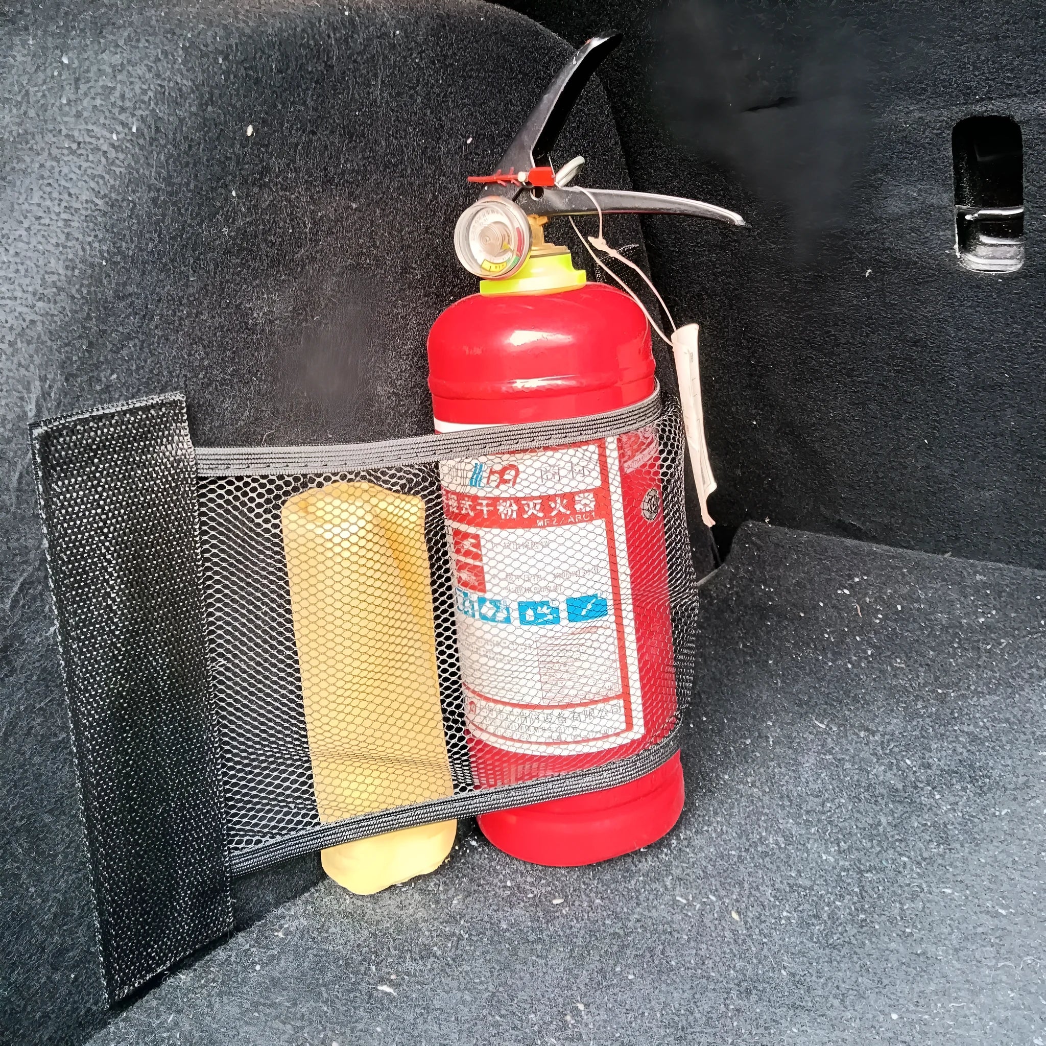 Polyester elastic storage net for organising items in a car boot, shown in 20x35cm and 20x45cm sizes.