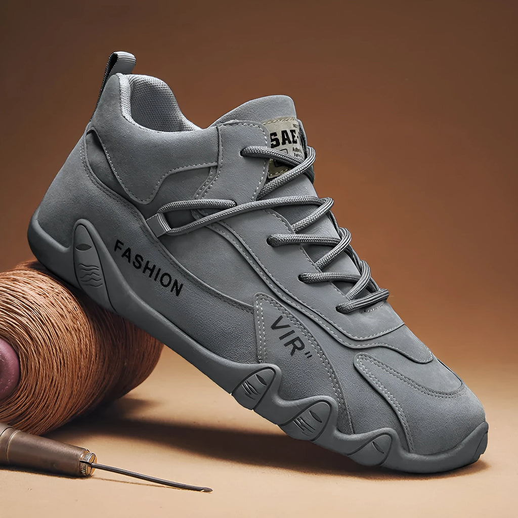 Men's grey low-top casual work shoes with non-slip sole and elastic band