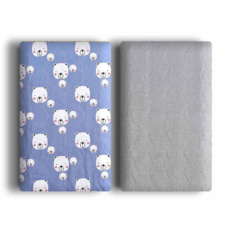 Cotton velvet pet blanket with dinosaur print in various sizes on a dog bed.
