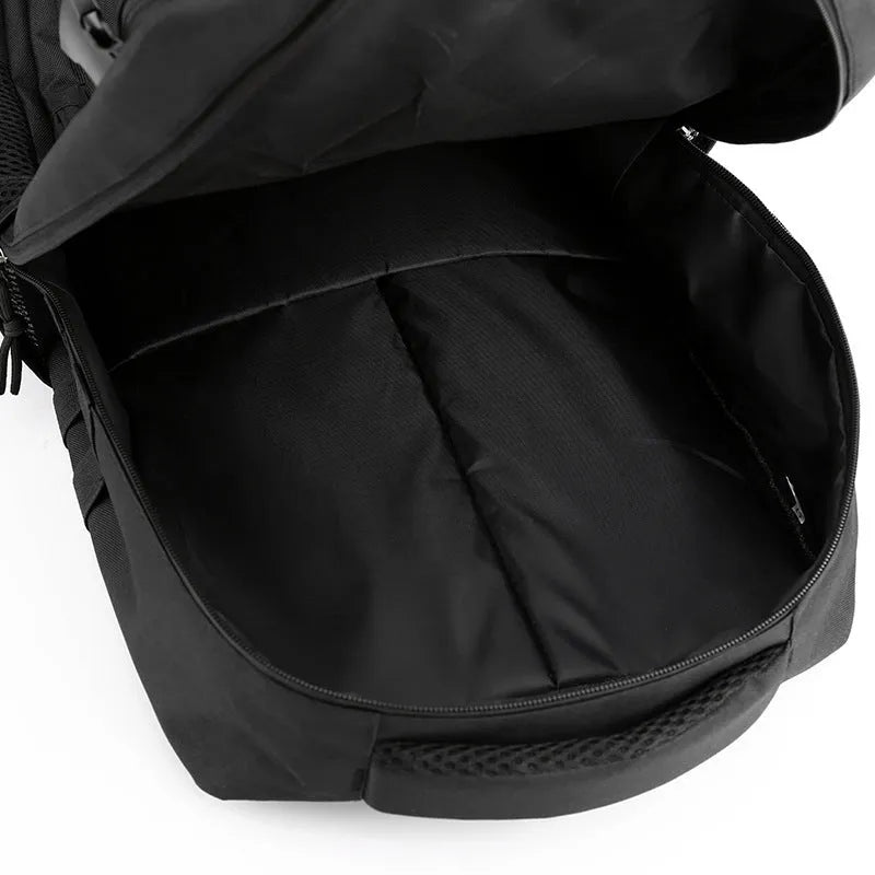 Outdoor mountaineering backpack in camouflage colour with curved shoulder straps and multiple compartments