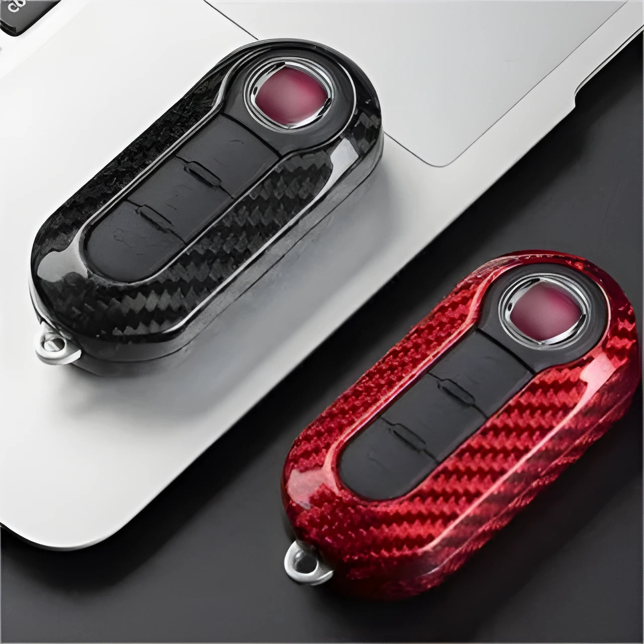 Carbon fibre and glass fibre replacement shell for a car key fob in Black, Red, and Silver Black colour options.