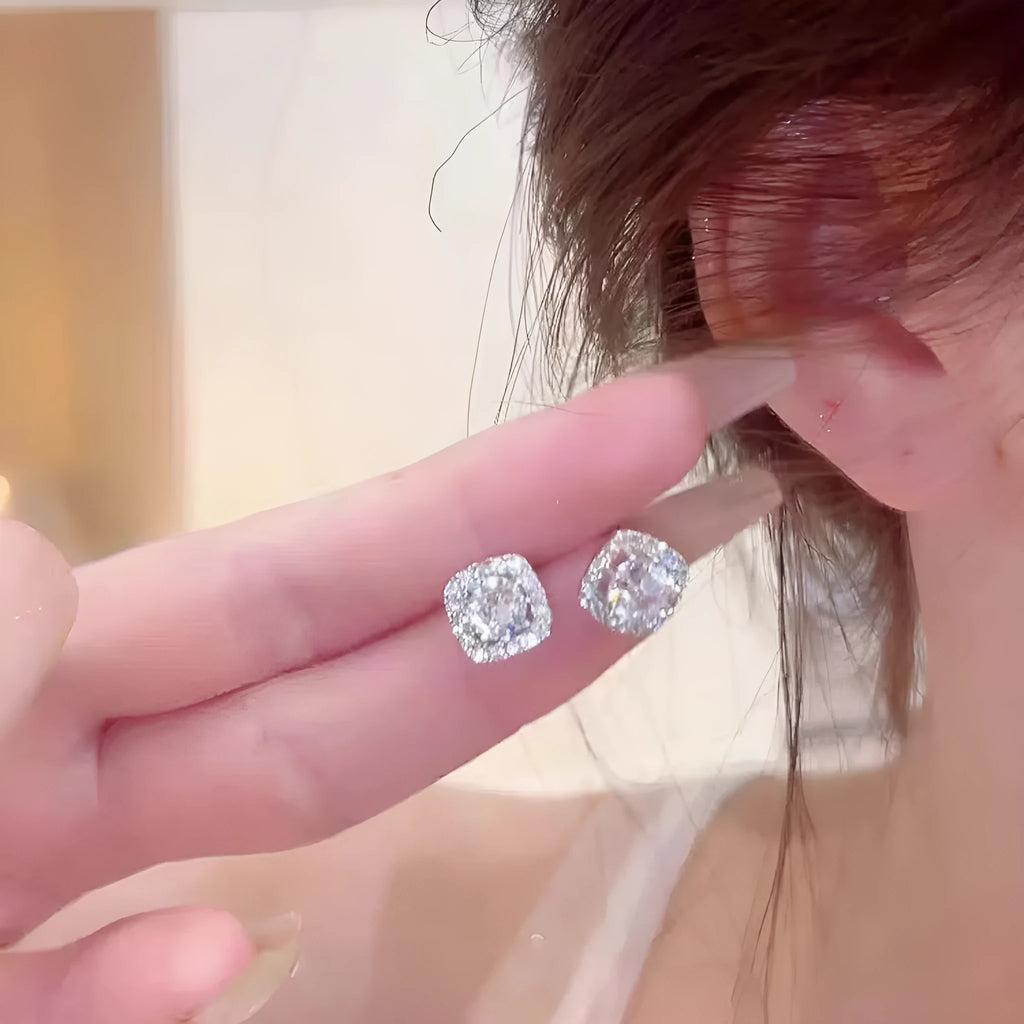 A pair of square geometric diamond-cut earrings for women in silver or gold colour.