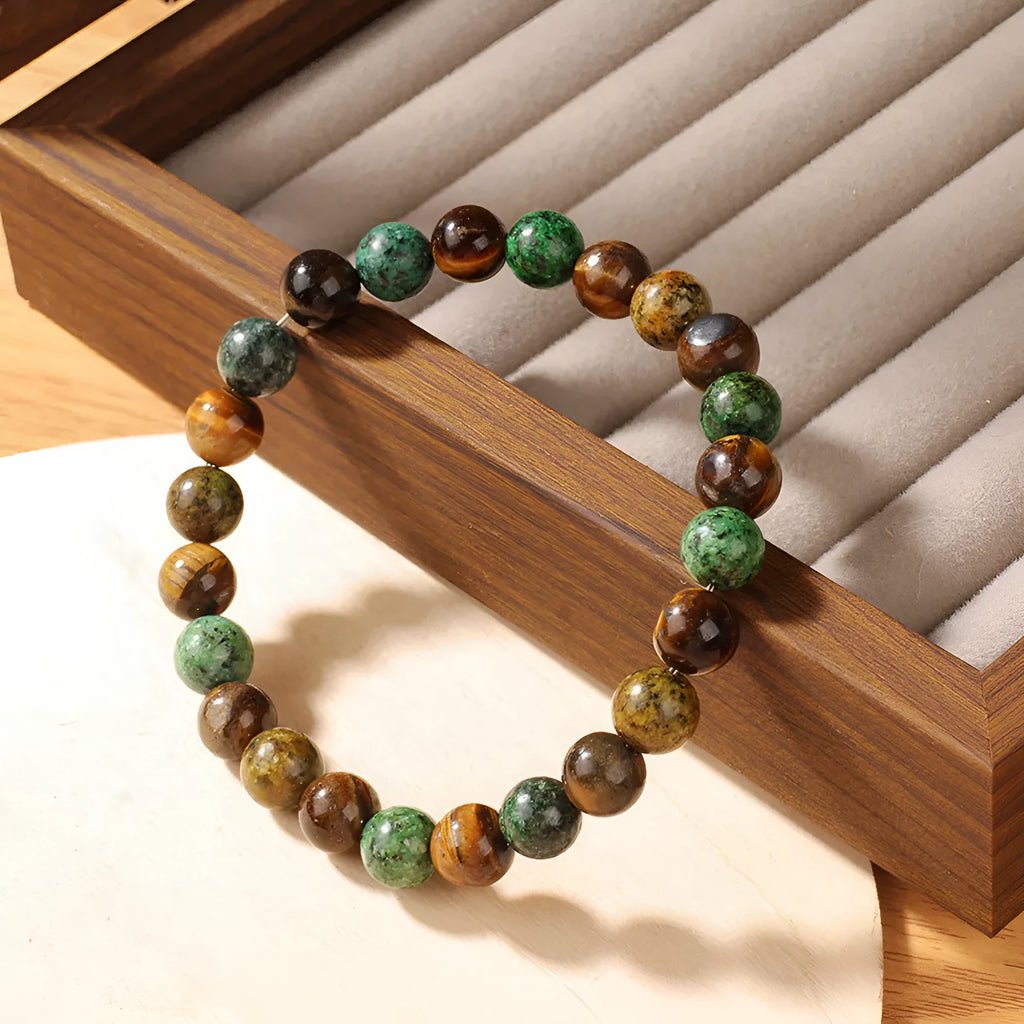Tigereye stone bracelet with antique flower design measuring 18mm in L1805 colour