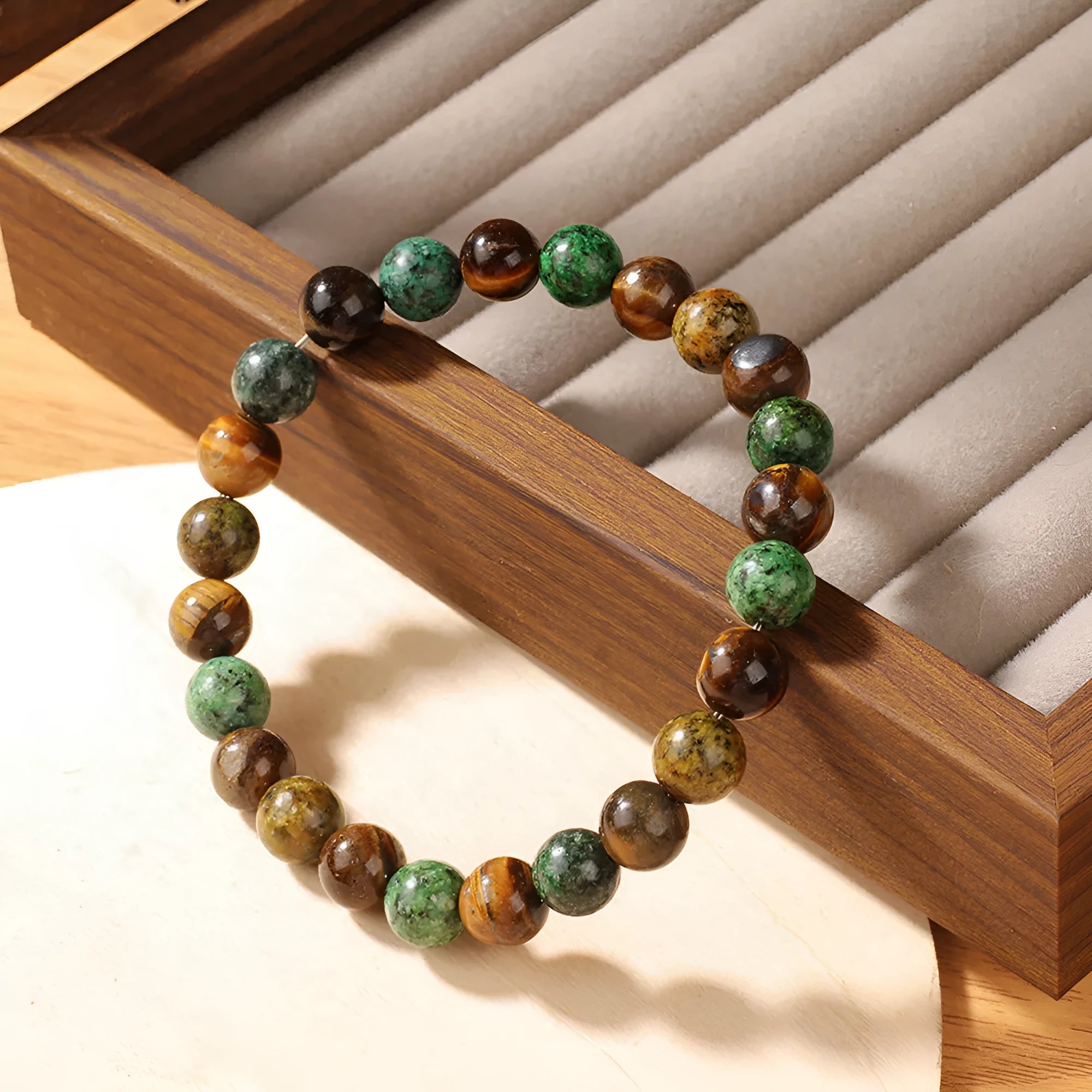 Tigereye stone bracelet with antique flower design measuring 18mm in L1805 colour