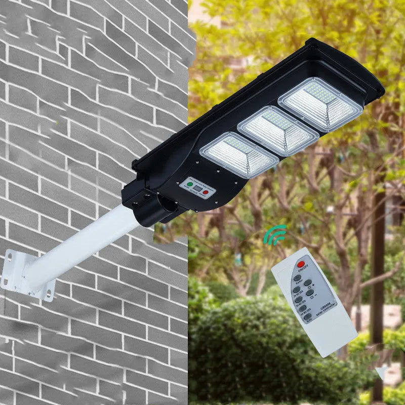 Integrated solar street light with solar panel and LED light source for outdoor illumination
