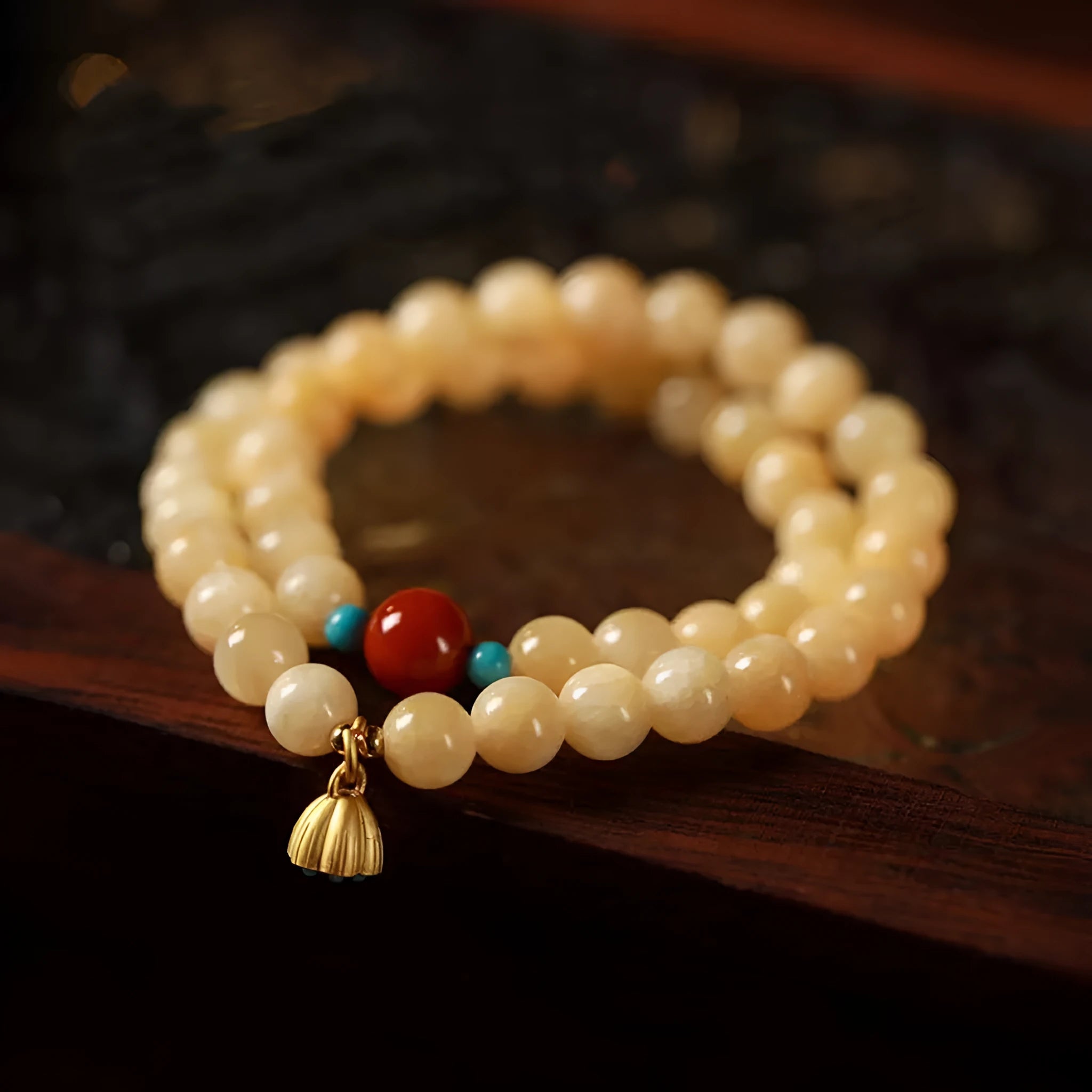Yellow jade handmade double ring bracelet showing hand-woven texture and retro style