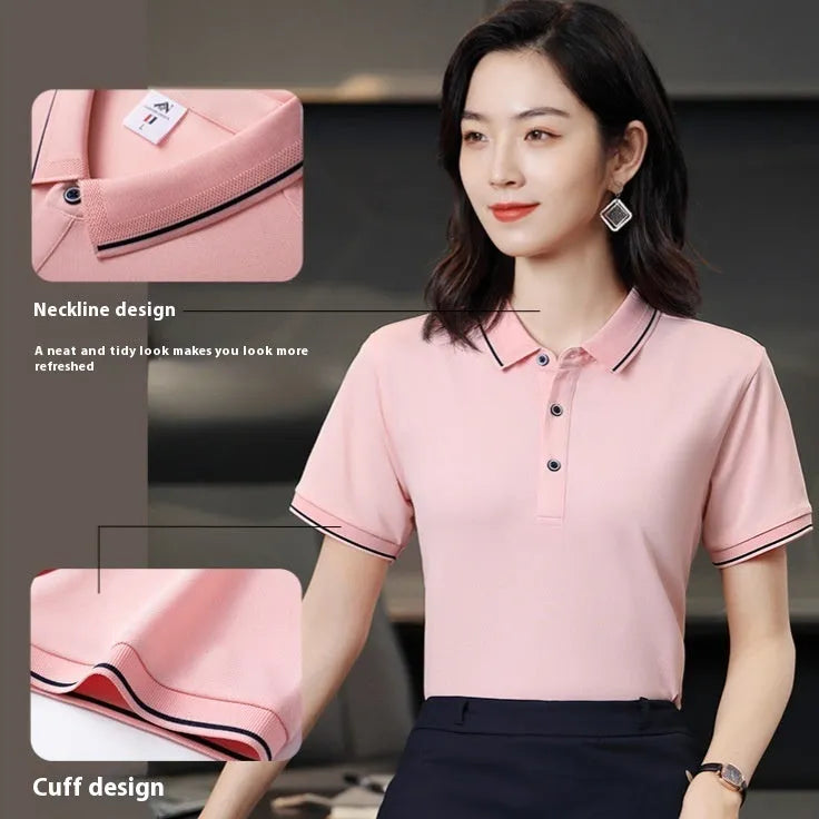 Short-sleeved beautician work polo shirt in cool silk cotton on a hanger, showing asymmetric detail and collar.