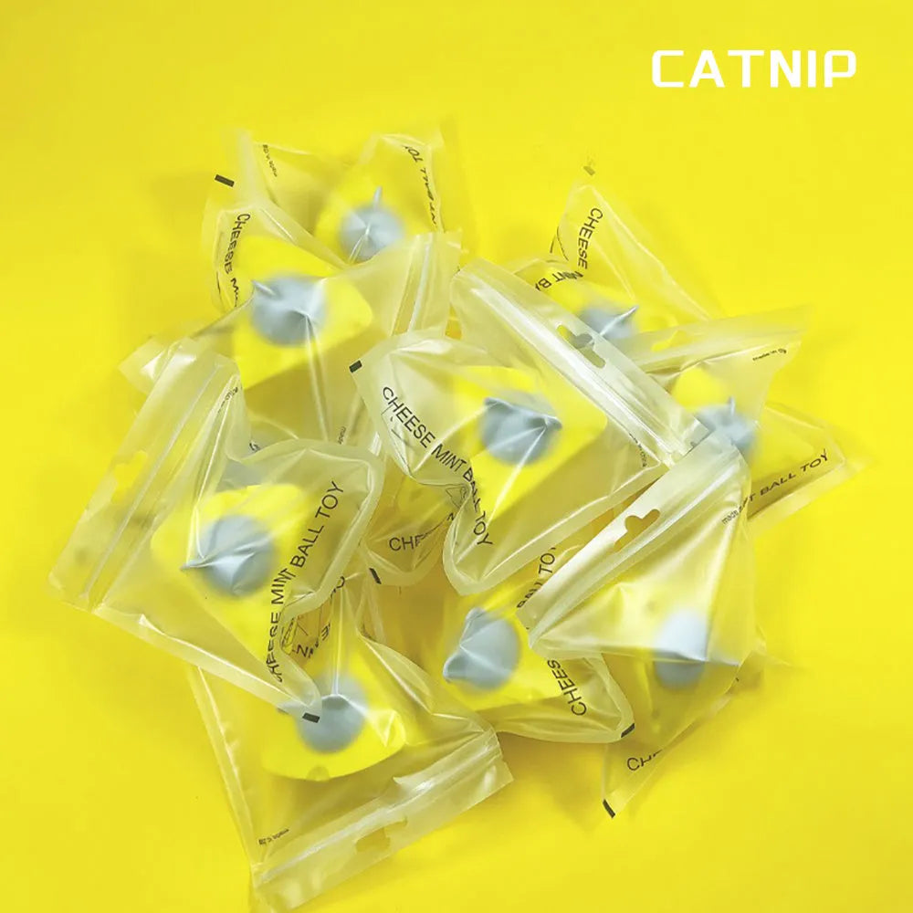 Yellow catnip and silvervine chew toy balls for indoor cats dental care