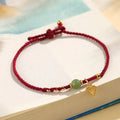 Handmade women's woven bracelet with 925 silver and Hetian jade in red strap option