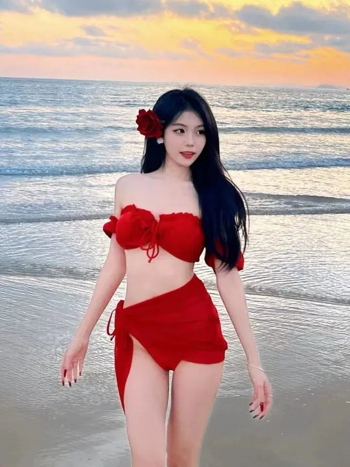 Red women's bikini swimsuit with puff sleeve skirt design and briefs-style bottom