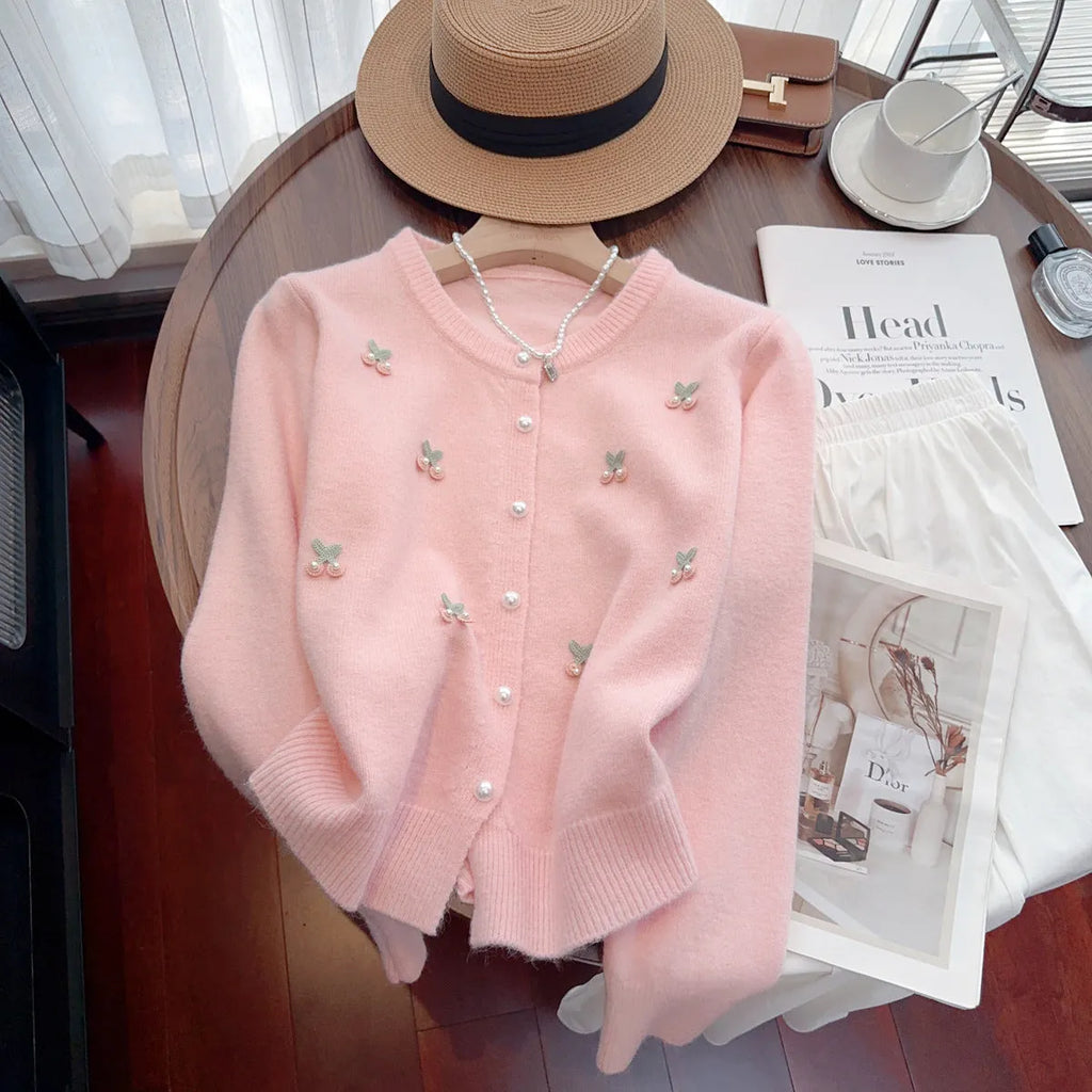 Women's beaded cashmere cardigan in slim fit free size showing round neck and decorative detail