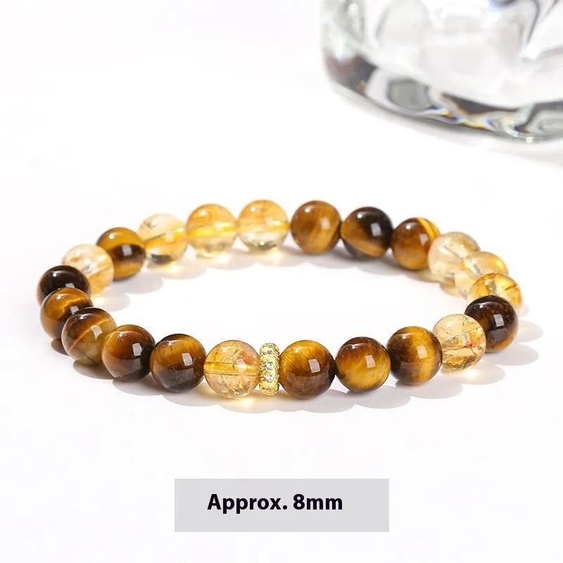 Yellow tiger-eye gemstone bracelet with 8mm round beads in a Jinba geometry design.