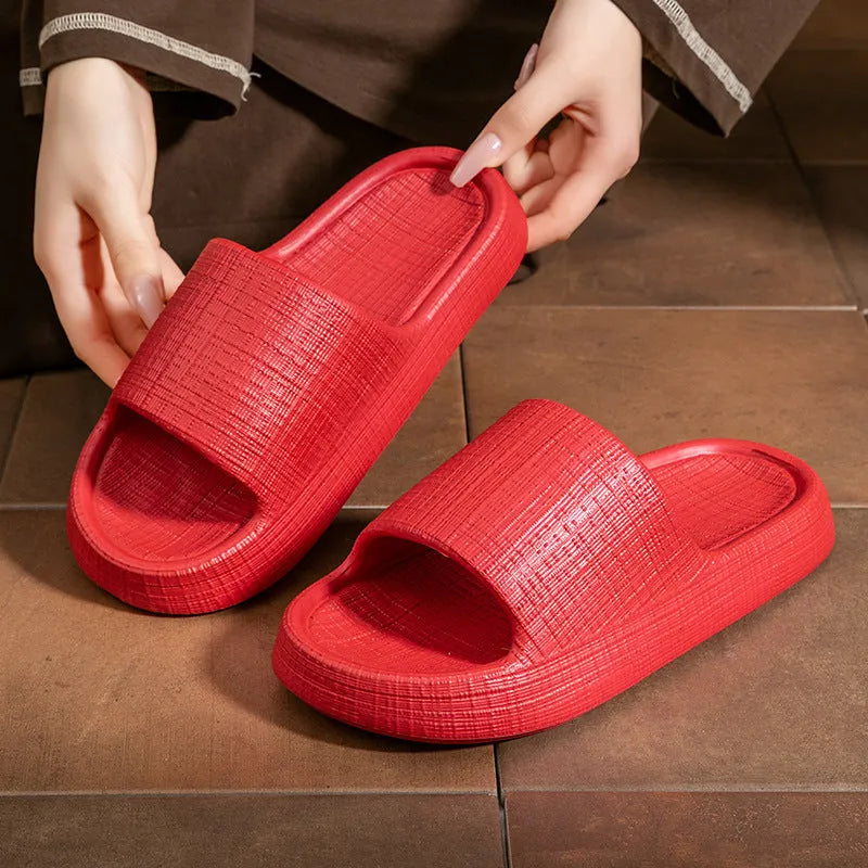 A pair of soft EVA flip flop slippers with a toe ring and non-slip sole, shown in one of five available colours.
