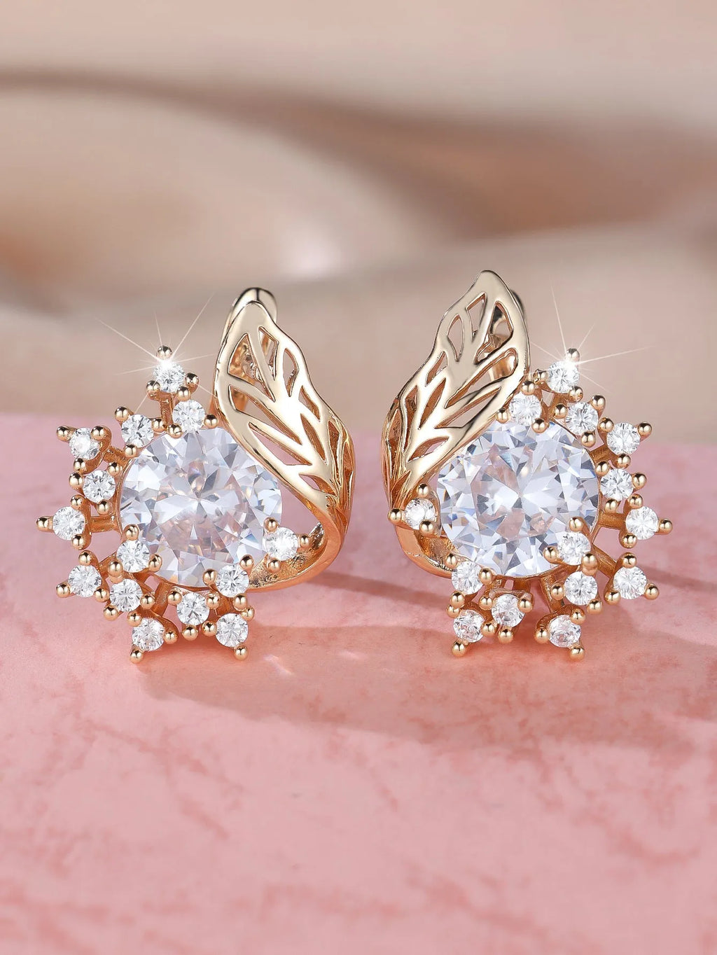 Round flower feather earrings with zircon stones in champagne gold finish, approximately 2-3cm diameter