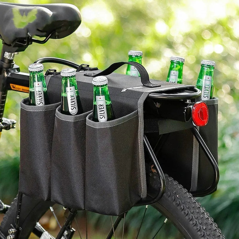 Black and orange double-sided bicycle drink storage bag mounted on a bike frame.