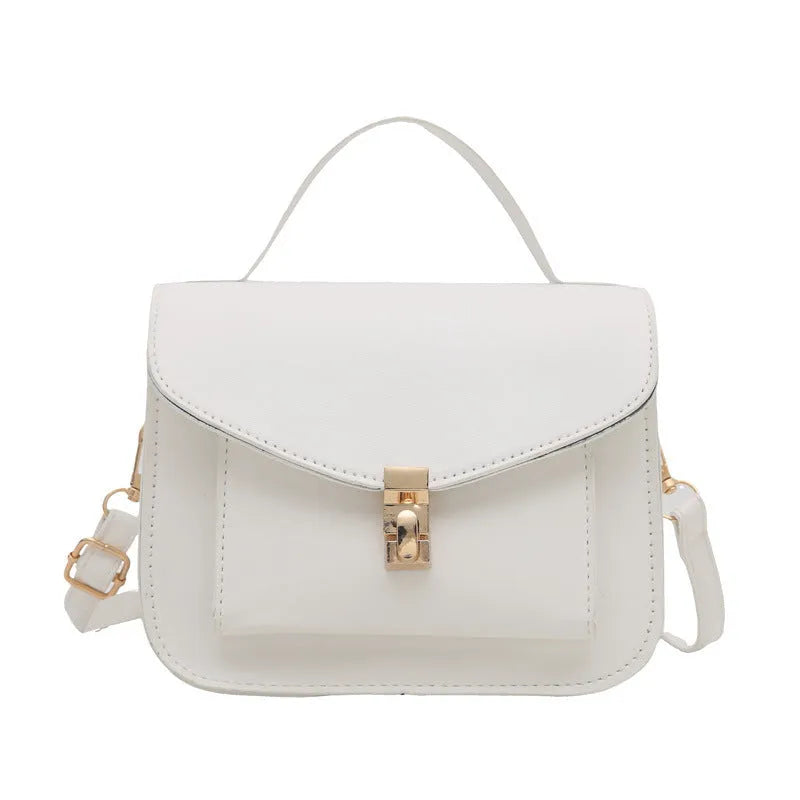 Retro shoulder messenger bag in horizontal square design with crossbody strap and sandwich pocket