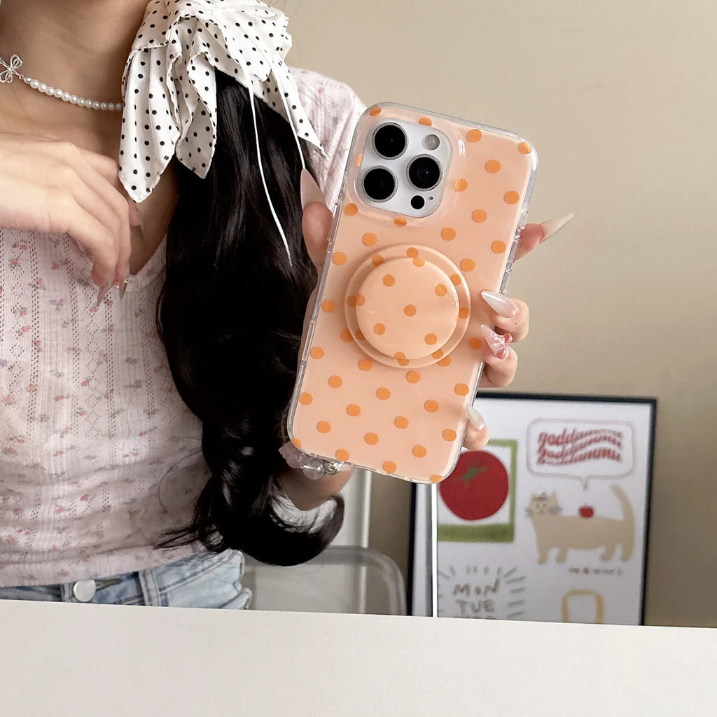 Polka dot iPhone case with magnetic bracket in black, pink, blue, and purple, compatible with iPhone models.