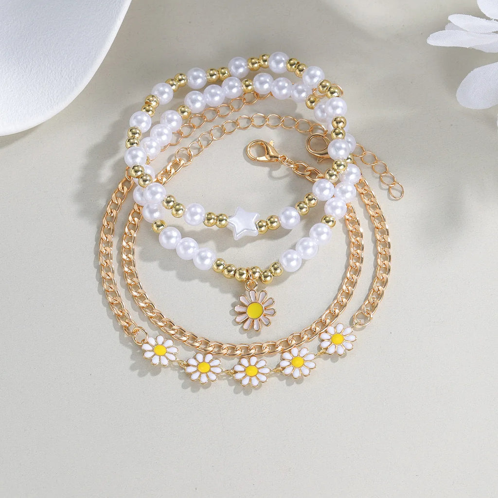 Four mixed material alloy bracelets with Little Daisy geometric charm in XY-4325 colour
