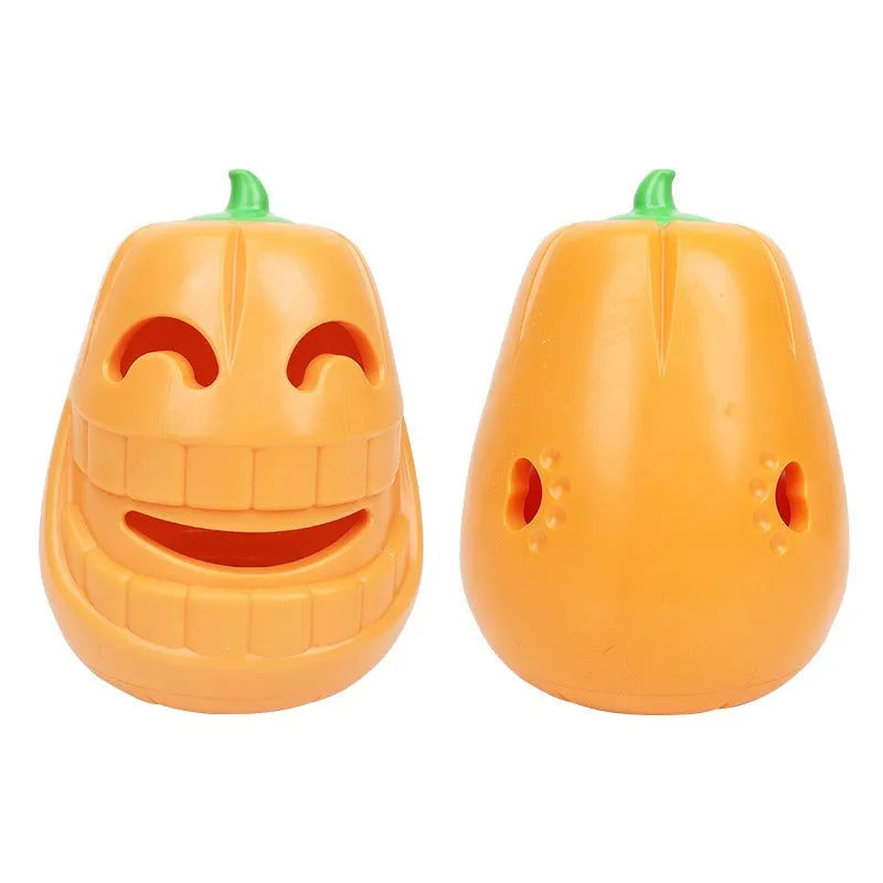 Orange Halloween pumpkin shaped interactive dog chew toy with treat-dispensing funnel