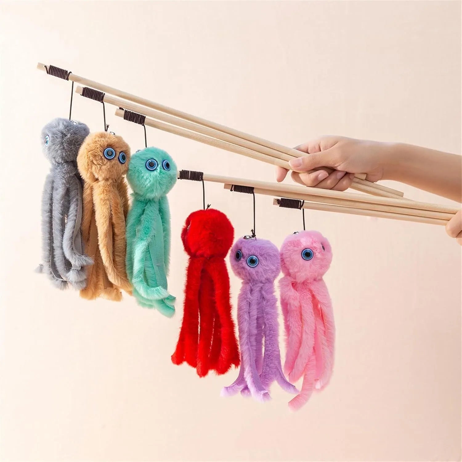 Octopus-themed cat toy with long stick in bright colours for indoor kitten play