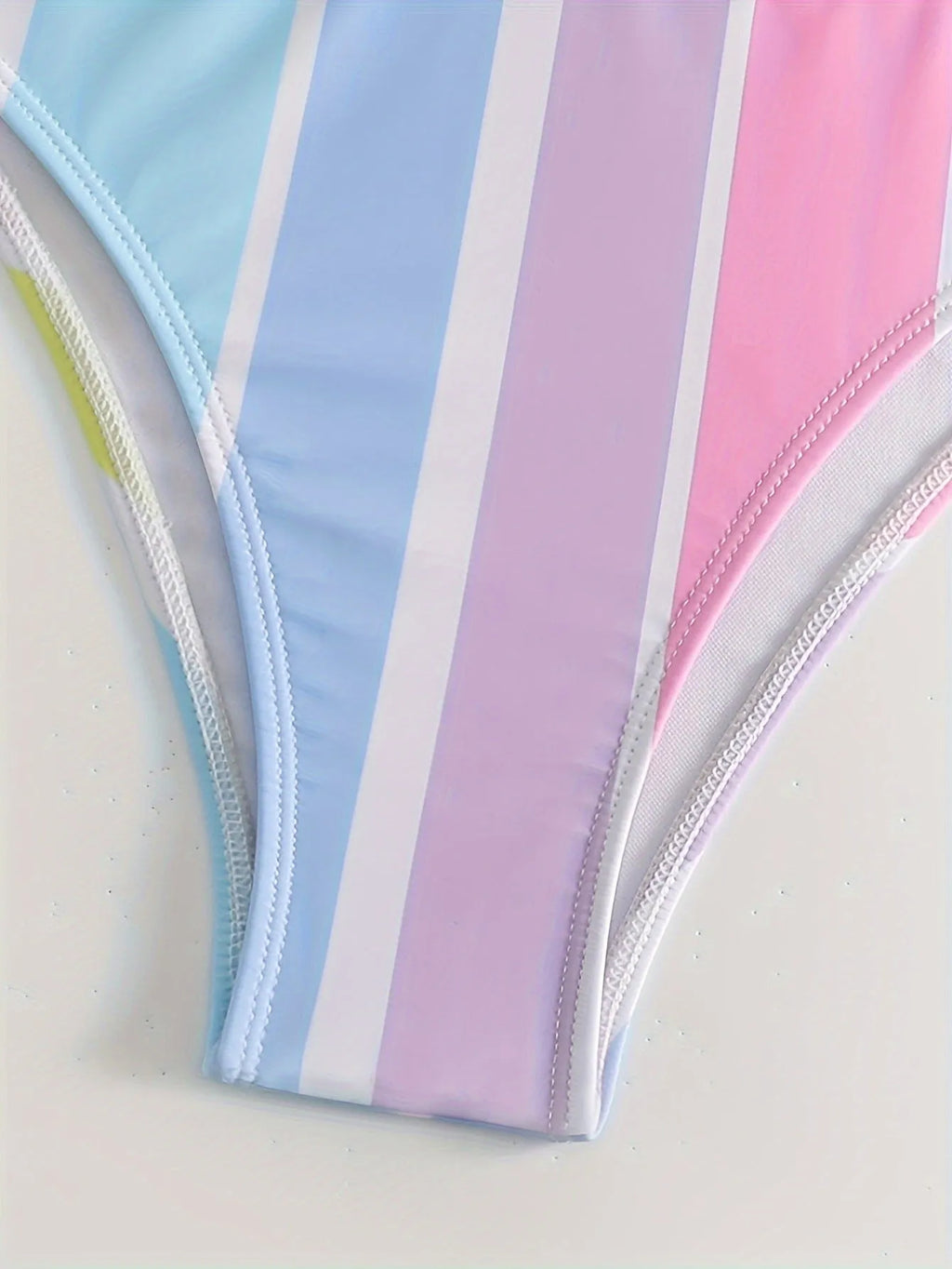 Women's striped two-piece bikini set for swimming and sports.