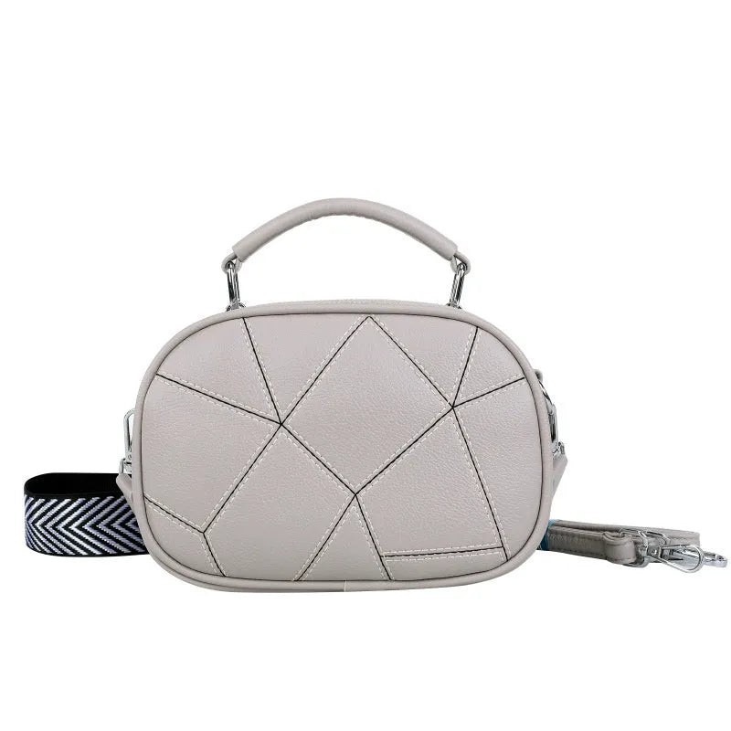 Round grey retro patchwork small bag with visible stitching, 20x15 cm size.