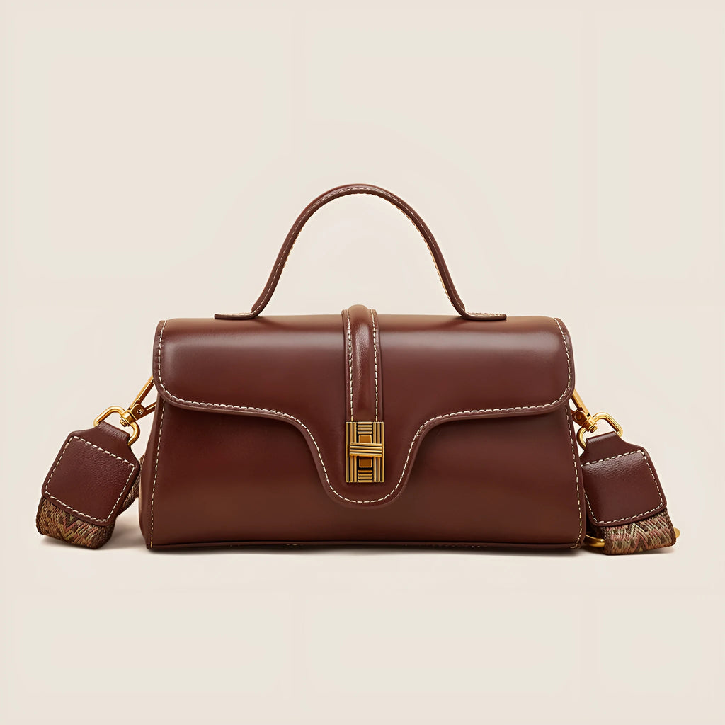 Brown Cambridge leather messenger bag with lock closure showing clamshell opening and internal organisers