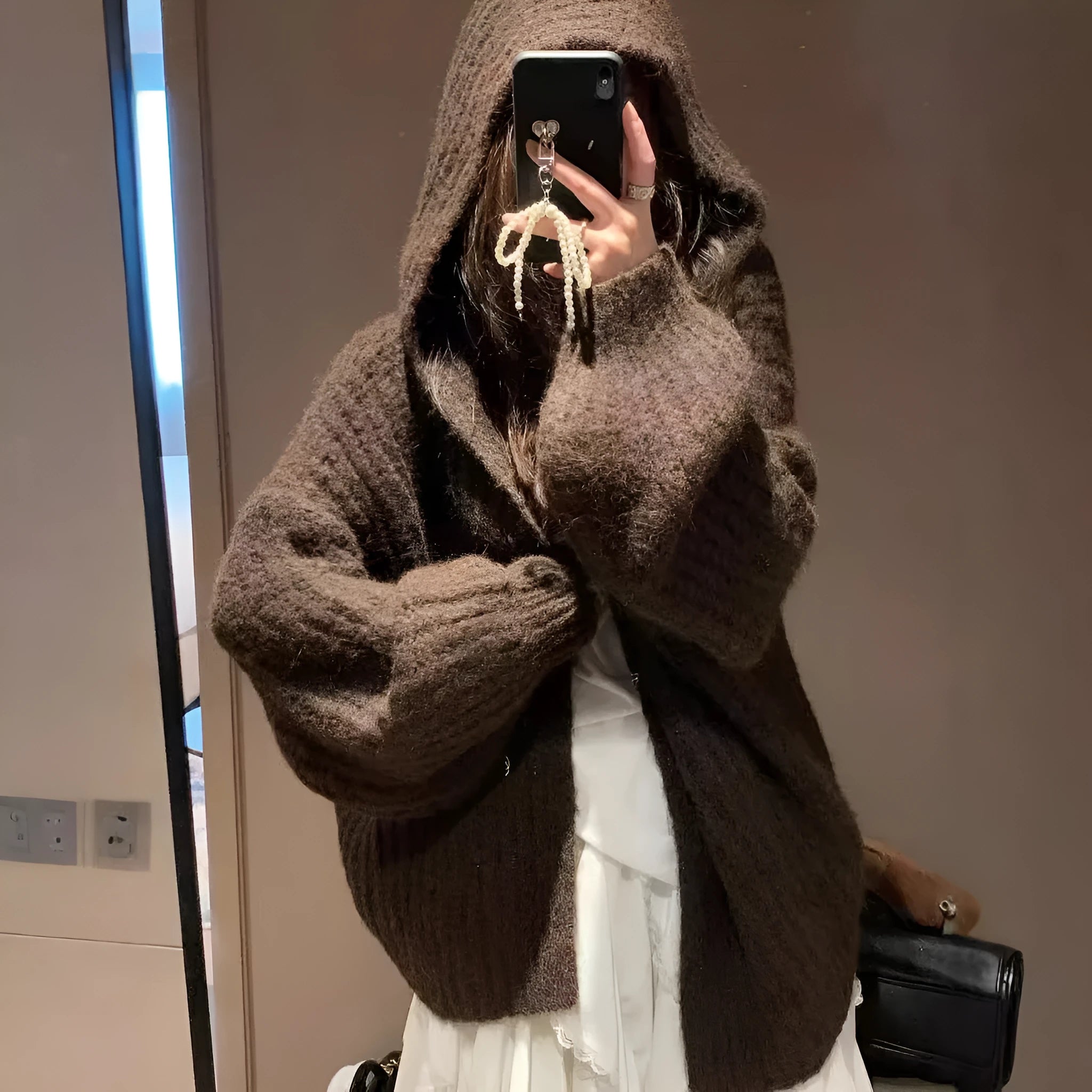 Women's retro-style thick hooded cardigan in dark grey, shown open as a sweater.