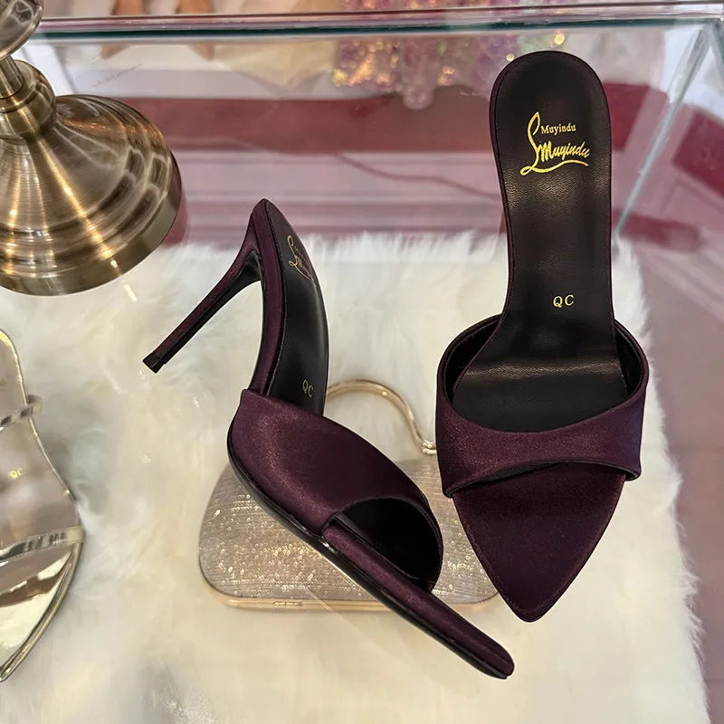 Women's black patent leather pointed toe sandals with an 8cm stiletto heel and ankle strap.