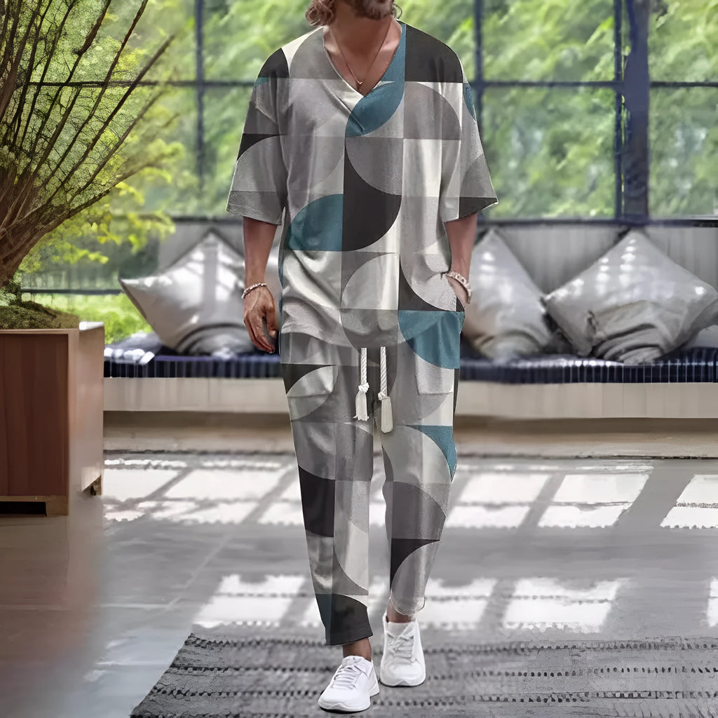 Lightweight polyester trousers suit with V-neck cropped sleeve jacket and matching trousers in multiple colours.