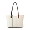 Women's black genuine leather crossbody bag with square shape and single shoulder strap.